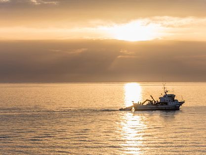 Sunset and a fishing boat
